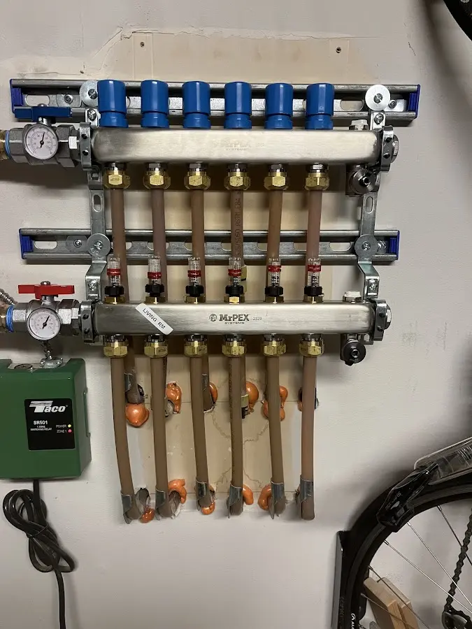 Plumber performing Water Heater Repair at a residential property in Garwood